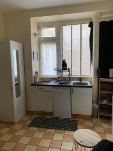 Louer Appartement 14 m2 Paris-10eme-arrondissement