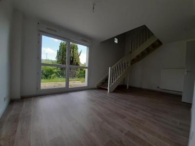 Louer Appartement 68 m2 Plancher-bas