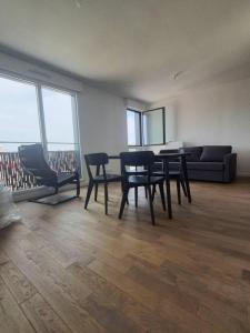 Louer Appartement 70 m2 Courbevoie